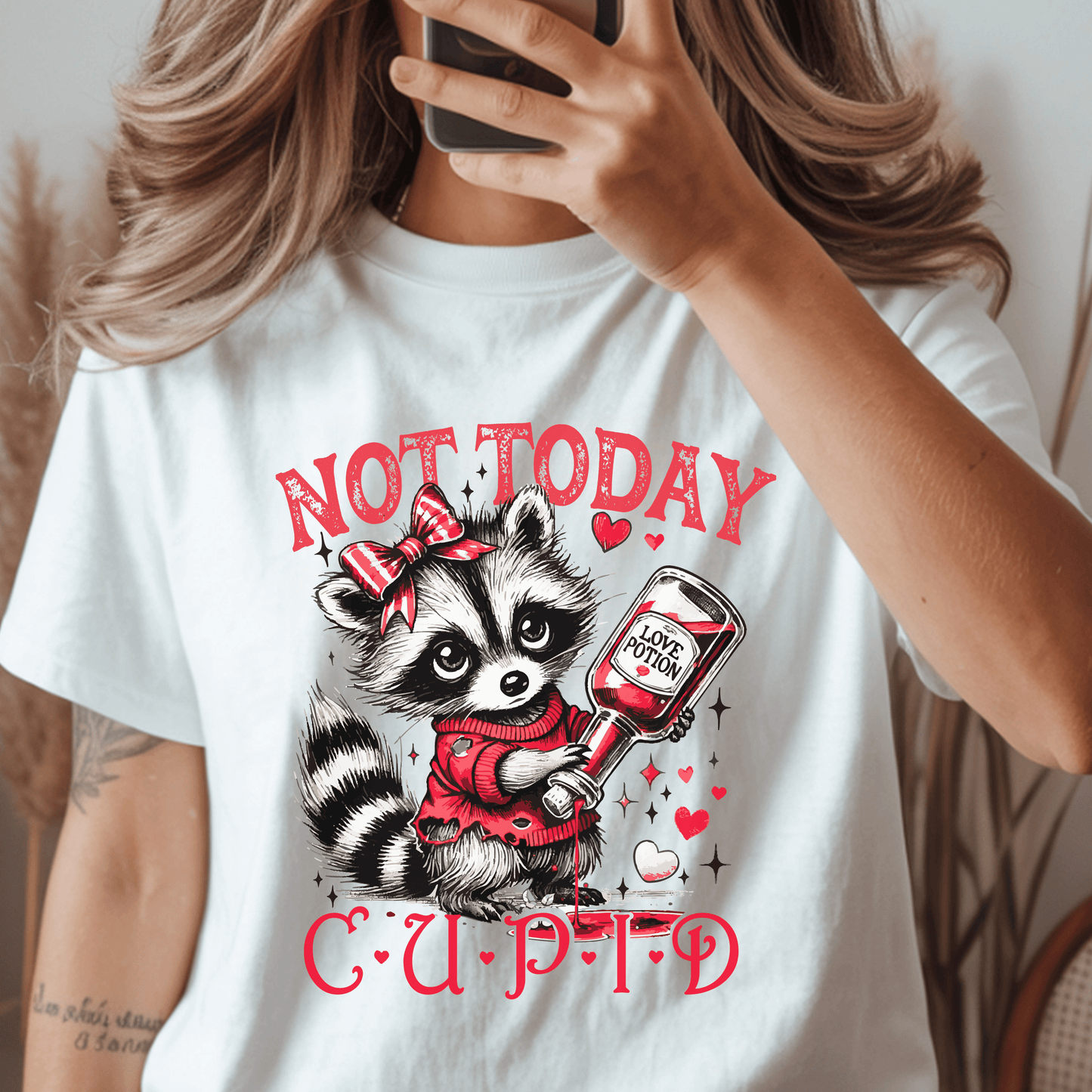 Not Today Cupid Raccoon DTF Transfer – Funny Valentine’s Day Graphic, Cute Anti-Cupid Shirt Design, Love Potion Raccoon Print