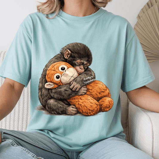 Punch the Monkey DTF Transfer | Cute Monkey Hugging Plush Toy Shirt Design | Adorable Animal Graphic Tee | Trendy Boutique Animal Apparel