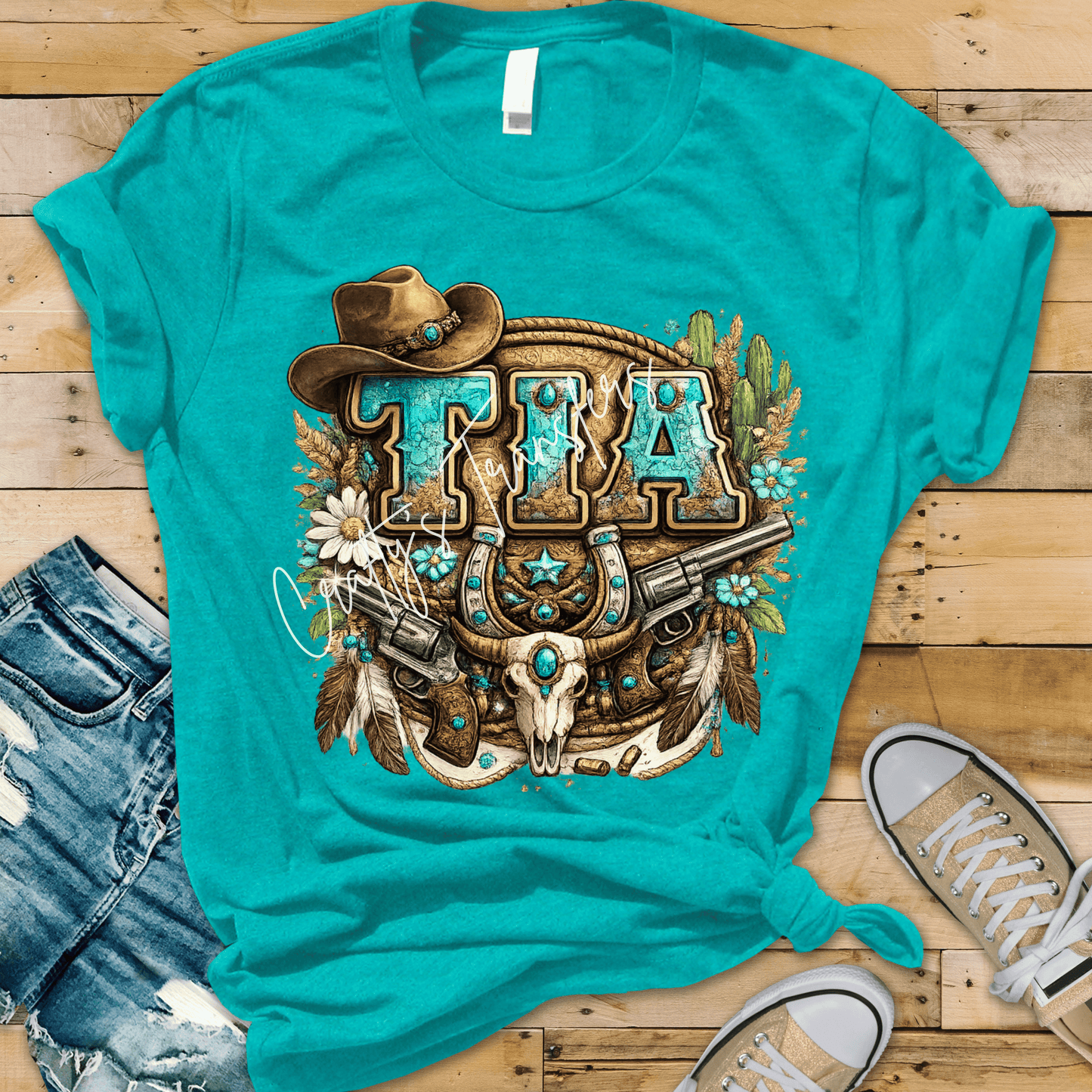 Tia Western DTF Transfer – Turquoise Cowgirl Name Design with Cow Skull, Guns & Hat – Rustic Country Shirt Transfer