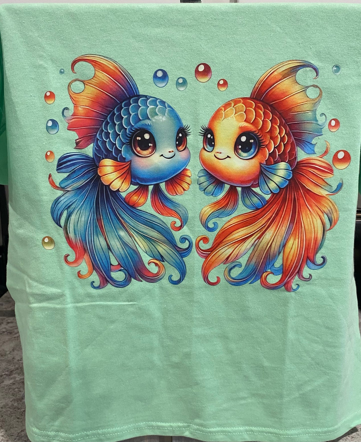 Youth Small - Pretty Coy Fish on Mint Green