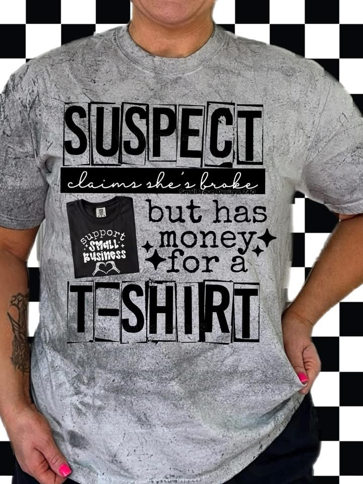 Suspect Claims She's Broke But Has Money For a T-Shirt